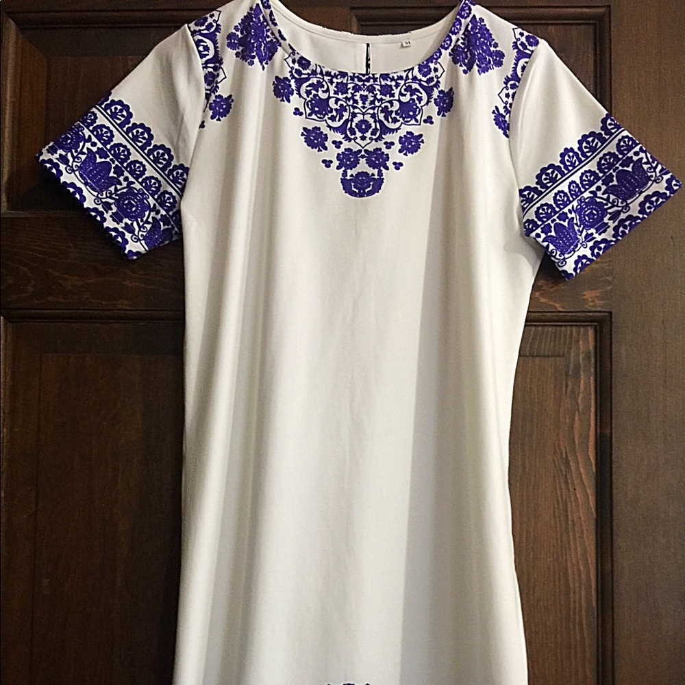 White with blue print dress